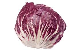 a type of chicory. It is round with a white base that branches into deep red - magenta - purple - deep purple leaves. The leaves are layered towards the center.