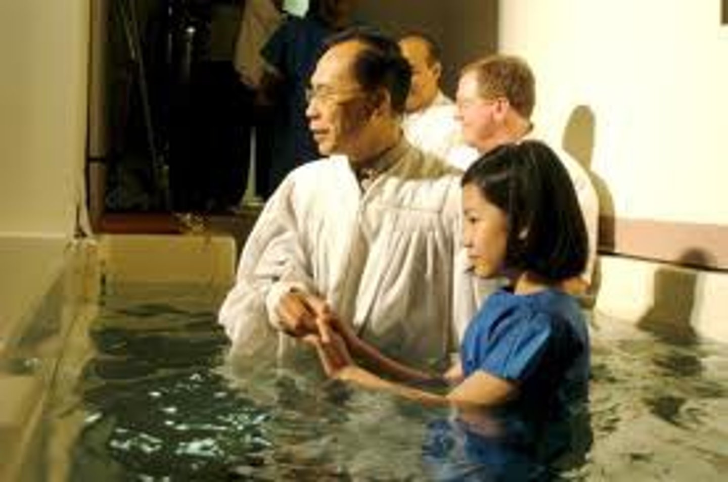 <p>sprinkling or immersion in water as a symbol of being pure and starting a new life in the Christian Church</p>