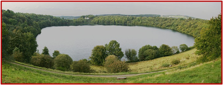 <p>A circular volcanic <mark data-color="red" style="background-color: red; color: inherit;">crater</mark> produced by an explosion<mark data-color="red" style="background-color: red; color: inherit;"> filled with water</mark></p><ul><li><p>caused by groundwater encountering magma, creating the explosion</p></li><li><p>derived from Latin <em><mark data-color="red" style="background-color: red; color: inherit;">mare</mark></em><mark data-color="red" style="background-color: red; color: inherit;"> meaning </mark><em><mark data-color="red" style="background-color: red; color: inherit;">sea</mark></em> - resembles a large lake</p></li></ul><p></p>