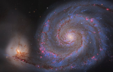 <p>(11.1) <span><span>What is the most likely classification of this galaxy (the large one)?</span></span></p>