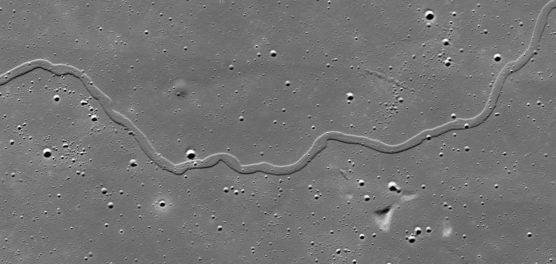 <p>Thought to have been caused by the buckling of the lunar surface as a result of compressive forces within the cooling, contracting lava, forming ridges up to hundreds of kilometres long.</p>