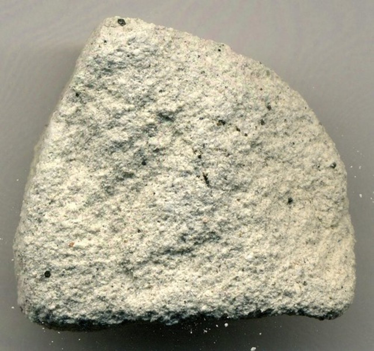 <p>Texture: Pyroclastic</p><p>Fragments: Less than 2mm</p><p>Formation: Welding of pyroclastic degree</p><p>Location: Convergent zone at the surface of the continental crust</p><p>Powdery sensation</p>