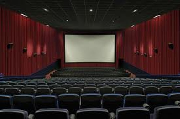<p>diàn yǐng yuàn - movie theater</p>