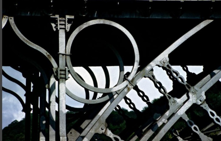 <p>Darby, Coalbrookdale, England, 1776-79, historically romans made bridges out of stone and with multiple arches. This one is one big arch made with iron. Darby was and engineer and an iron producer. He used the bridge to show what cast iron could do (advertisement) and also used the bridge as transportation for his goods. Made for people and carriages only. </p>