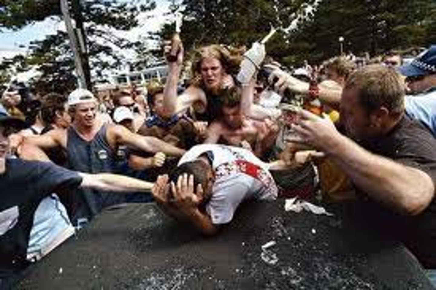 <p>The loss of self-awareness and individual accountability in group situations, often leading to impulsive and deviant behavior; for example, people acting more aggressively in a crowd during a protest.</p>