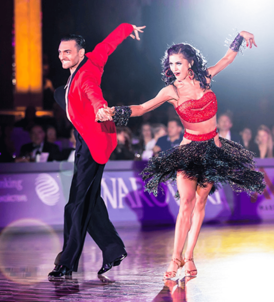 <p>originated in Cuba in the early 1950s and was created by Enrique Jorrín as a simplified version of earlier</p><p>dances like danzón and mambo, making it easier for people to follow the rhythm; its name comes from the sound of dancers' feet shuffling on the floor "cha-cha-cha" during a triple step, and it quickly became popular worldwide, eventually evolving into a standard Latin ballroom dance.</p>