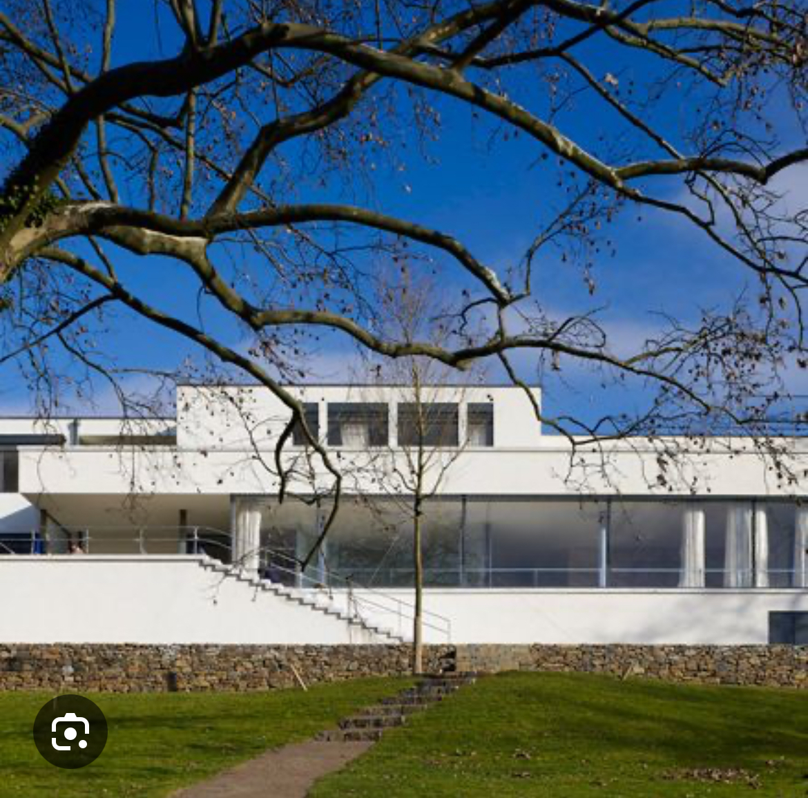 <p><span><span>Open glass living room, steel columns, modern domestic interior</span></span></p>