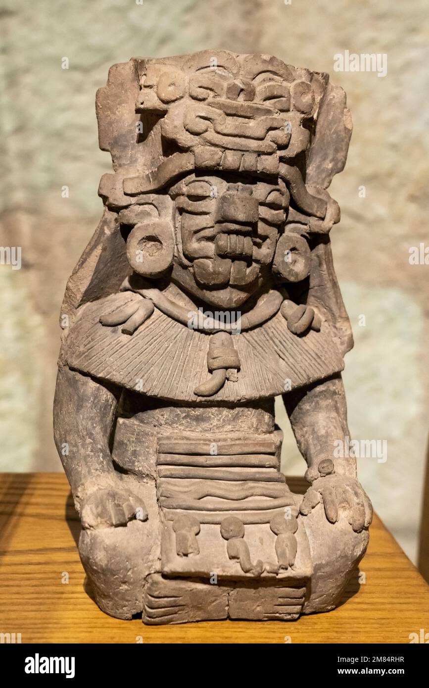 <p>Early Classic. Tomb door is surmounted by a ceramic figure with cocijo (rain god) headdress</p>