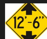 Warning sign: Low clearance sign

\
