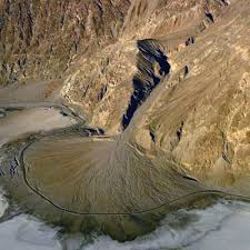 <p>Define an aluvial fan </p>