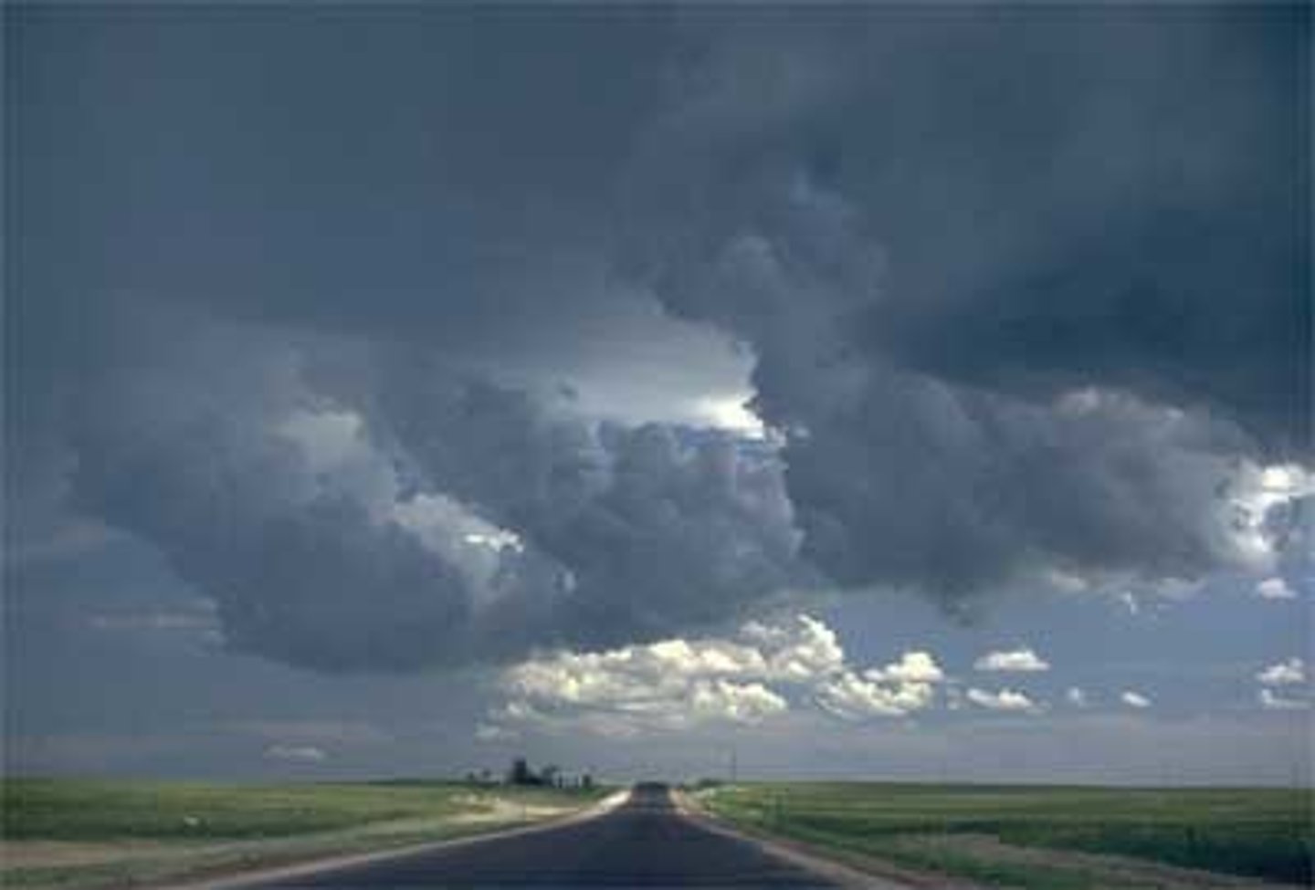 <p>large, fluffy, dark on the bottom. They may produce thunderstorms.</p>