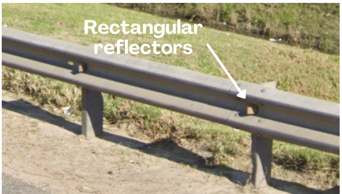 <p>Yellow and red reflectors on guardrails, also seen in Uruguay but with different support structures. [</p>
