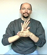 <p>Left hand moves side to side</p>