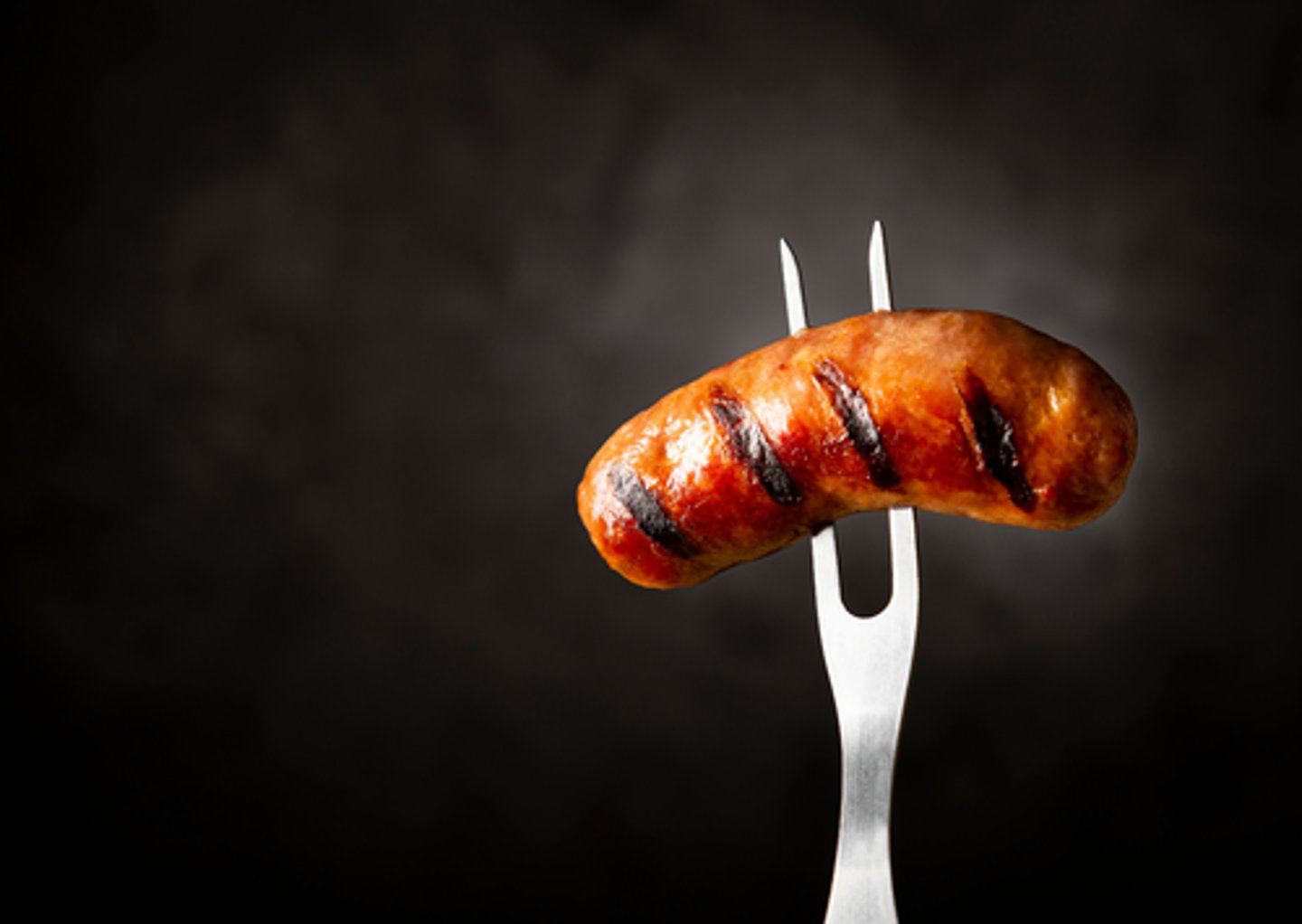 <p>a long fork with two sharp points, used to lift or turn food on a barbecue.</p><p>Dad used a long _________ to turn the sausages on the barbecue.</p>