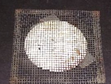 <p>Sits on the iron ring to provide a place to stand a beaker. On older wire gauze, the white material is asbestos!</p>