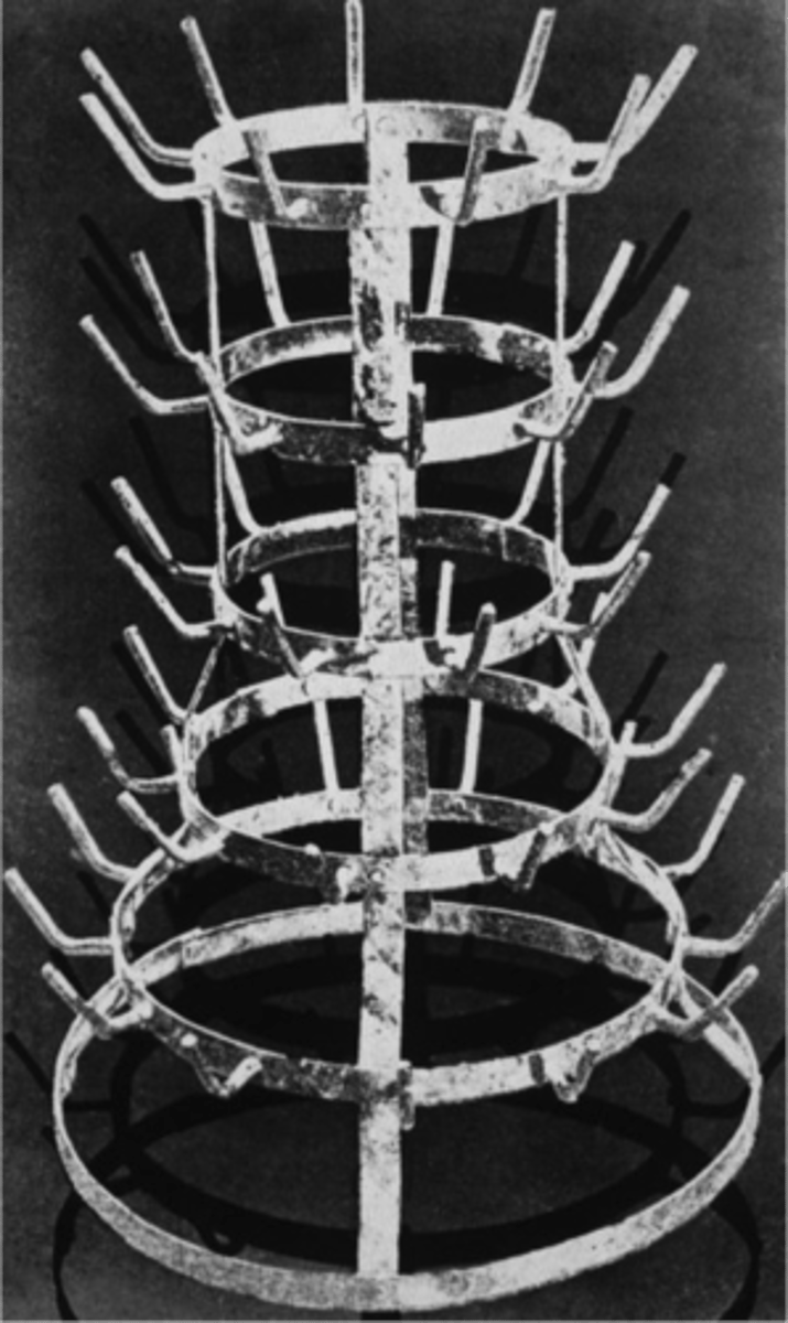 <p>Duchamp's 'readymade' bottlerack from 1914, which showed the difference between something useful and something beautiful in art.</p>