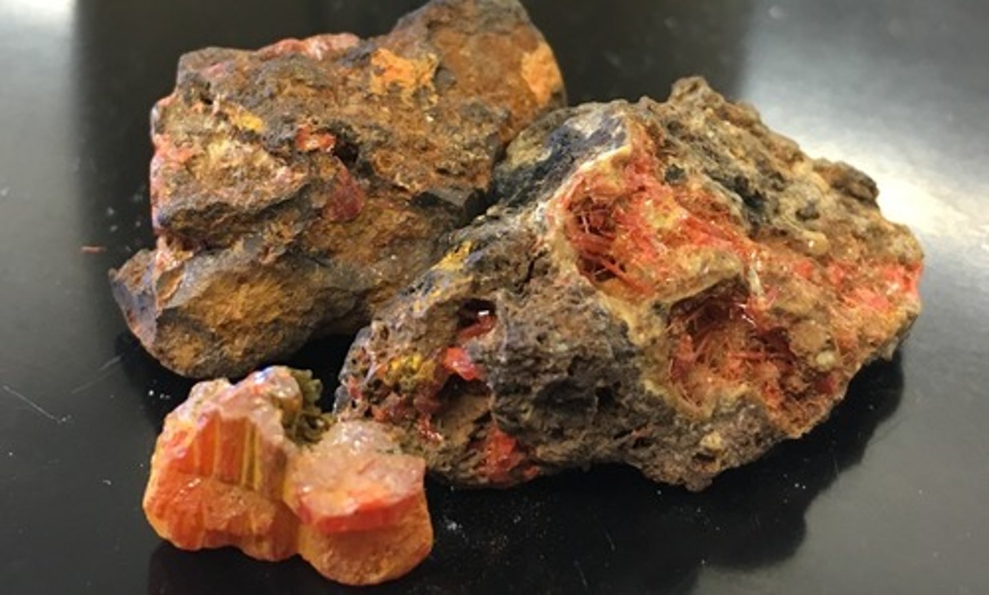 <p>Chromate.<br>Monoclinic. <br>Slender prismatic, vertically striated, columnar, granular.<br>H = 2.5-3<br>SG = 5.9-6.1<br>Adamantine luster.<br>Translucent. <br>Color = bright hyacinth-red. <br>Streak = orange-yellow.<br>Isostructural with monazite. <br>Rare, Cr was first discovered here.</p>