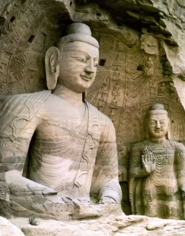 <p>What elements of the Seated Buddha are consistent with Buddhism? What is the historical context of this statue’s creation? </p>