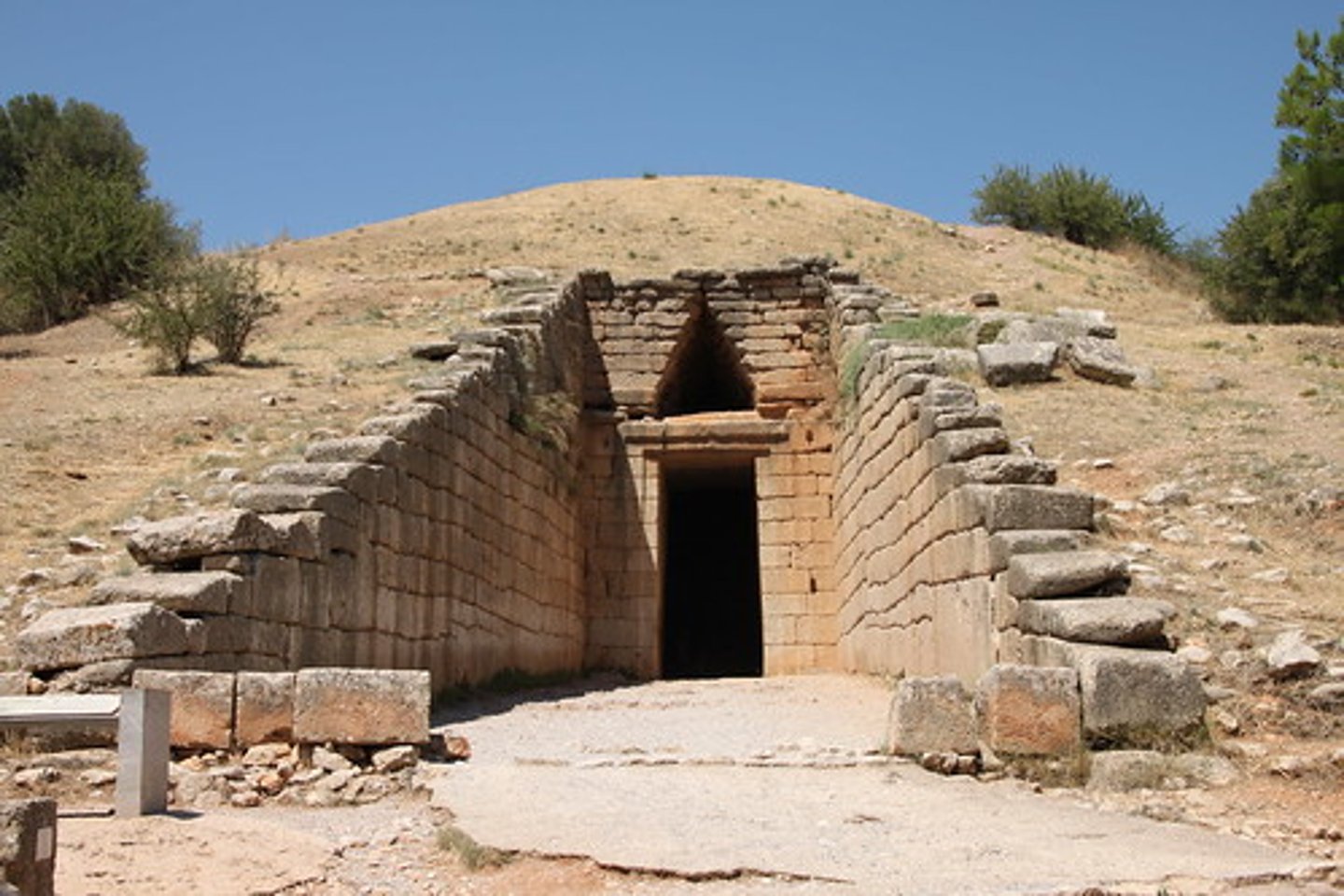 <p>Also called Tomb of Agamemnon, a beehive, or tholos,</p><p>tomb built about 1350 to 1250 BC at Mycenae, Greece. This</p><p>surviving architectural structure of the Mycenaean</p><p>civilization is a pointed dome built up of overhanging</p><p>(i.e., corbeled) blocks of conglomerate masonry cut and</p><p>polished to give the impression of a true vault.</p><p>a. Treasury of Atreus</p><p>b. house of Tsountas</p><p>c. Citadel</p><p>d. Tumulus of Bougon</p>