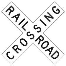 <p>you must look, listen, slow down, and prepare to stop, if necessary. Let any trains pass before you proceed</p>