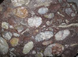 <p>Sedimentary, made up of other rocks large rounded grains</p>