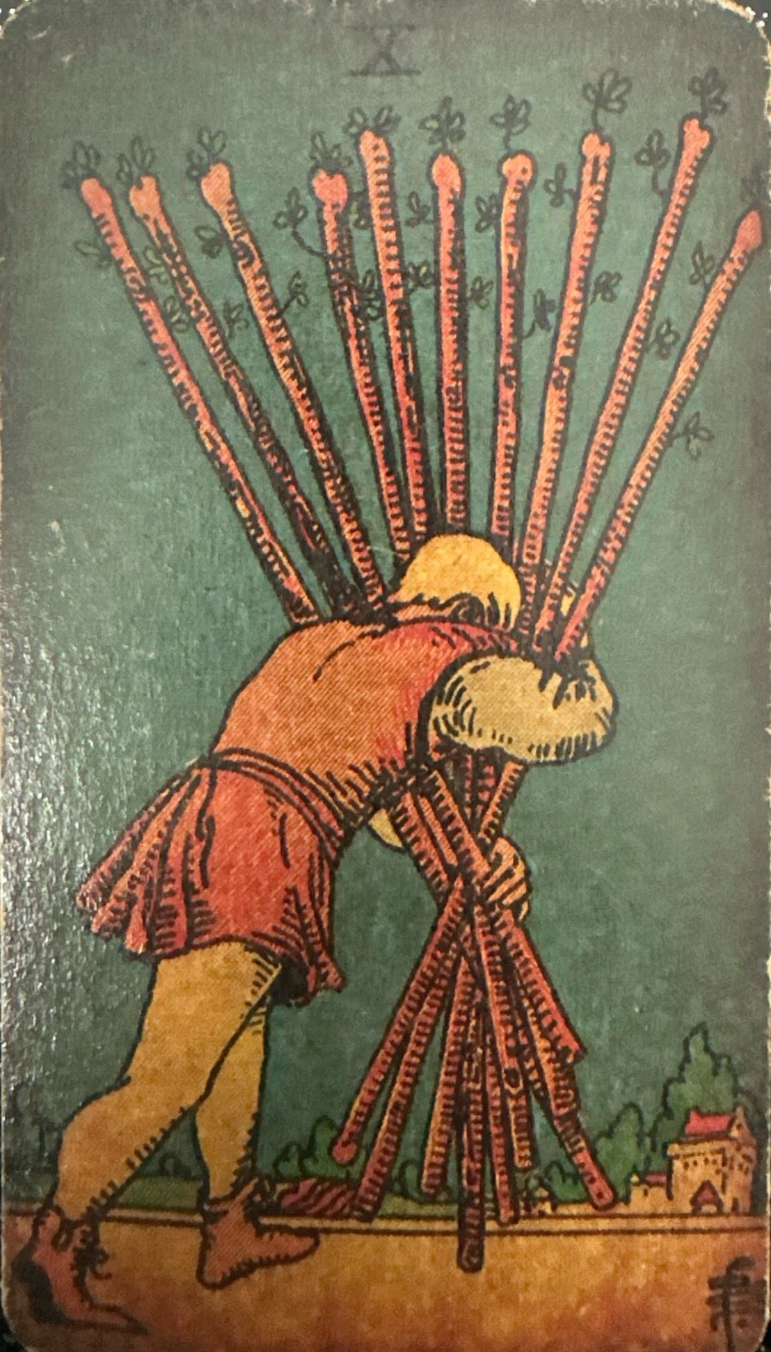 <p>X - Ten of Wands</p>