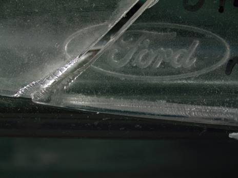 <p>where a piece of glass breaks into relatively large pieces that have at least one, good, intact edge that be fitted to the edge of another piece from the same source</p>