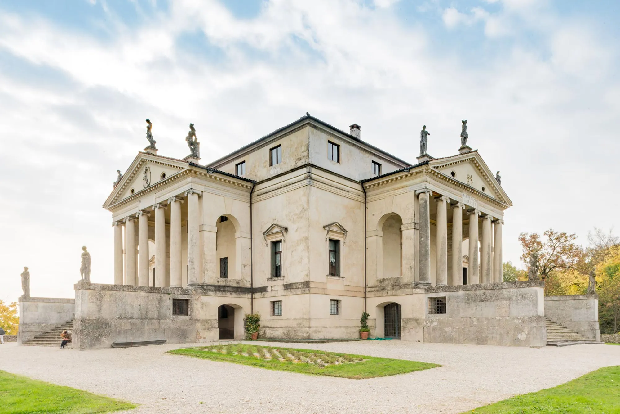 <p>characterized by the exaggeration of classic features in a square building with pillared portico on each face leading to a central circular hall with dome</p>