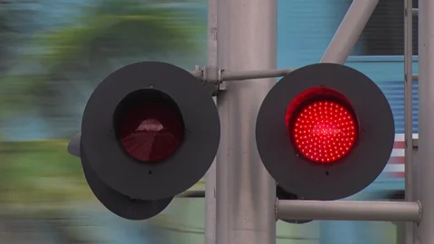 <p>Flashing red light at Railroad Crossing</p>