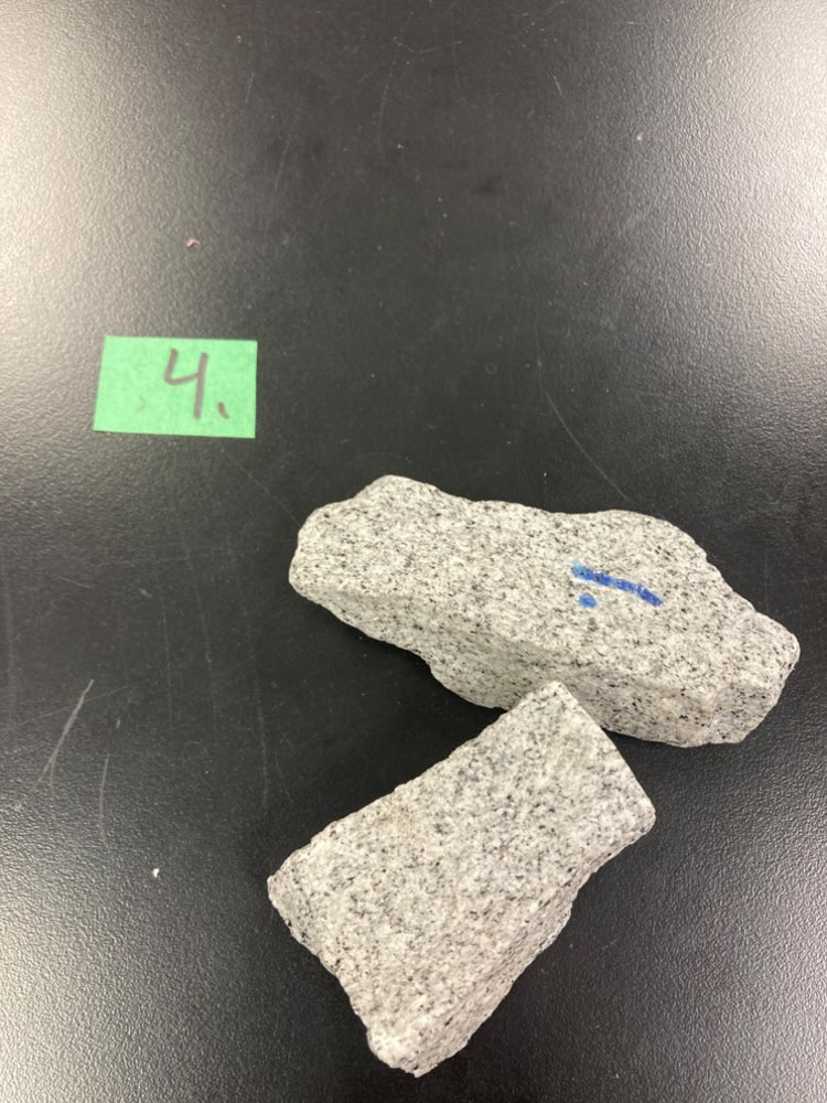 <p>This is ________</p><p>It is often black flecks we see in this common intrusive igneous rock _____</p>