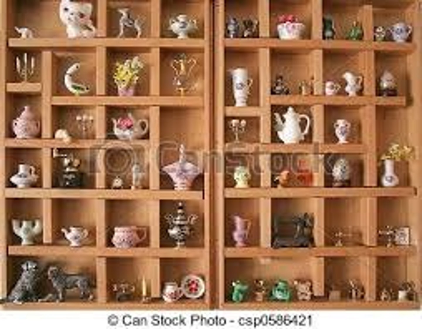 <p>a small decorative ornament, especially in a house</p>