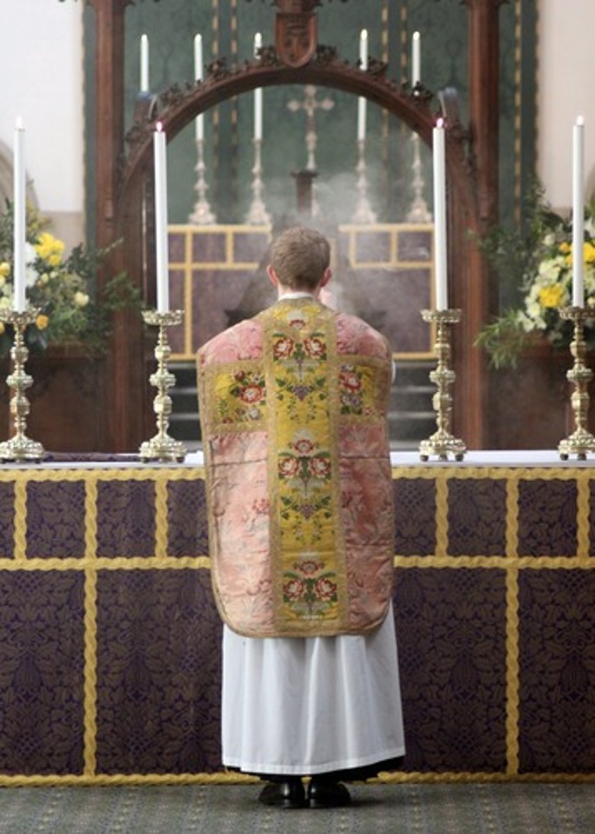 <p>clothing worn to symbolize religious or political authority</p>