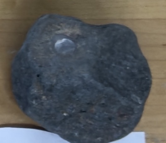 <p>Light grey, grey, slightly shiny, white/green streak </p>