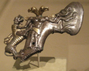 <p>Shaft-hole axe head with Bird-headed demon, boar, and dragon</p>