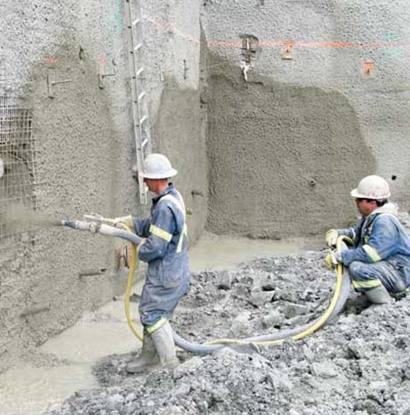 <p>Stiff concrete mixture that is sprayed directly from a hose onto the soil shortly after the soil is excavated.</p><p>- the hardened concrete reinforces the slope and protects against erosion.</p>