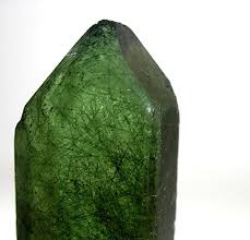 <p>Green!! doesn’t really have cleavage, and is about a 6-7 on the hardness scale. Leaves a white streak</p>