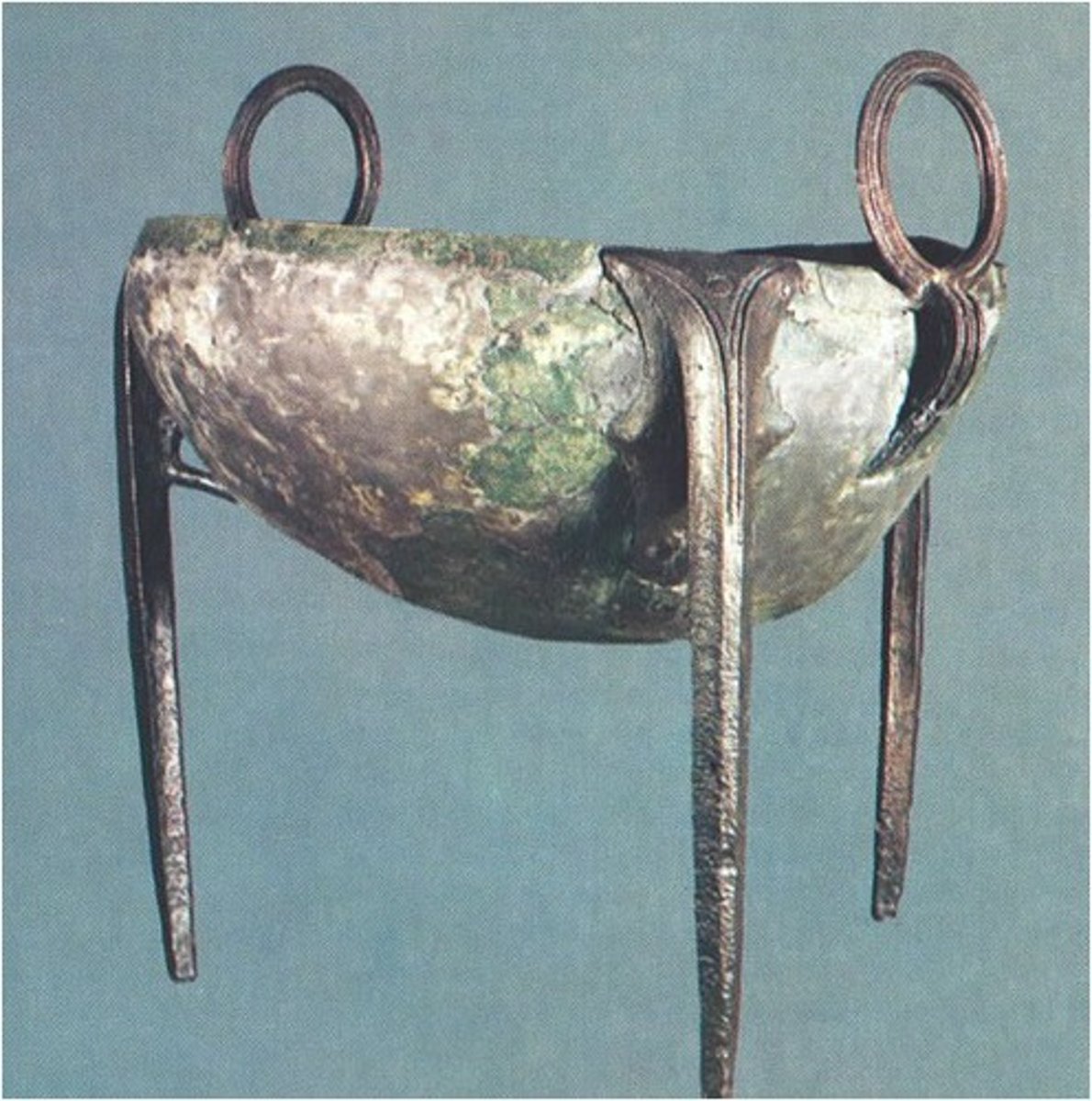 <p>Who: The Tripod Cauldron was created by ancient Greek artisans1.</p><p>What: It's a large bronze tripod cauldron21. Tripod cauldrons were often used in ancient Greece for cooking or as votive offerings3.</p><p>Where: The cauldron was discovered in Olympia, Greece21. It is currently housed in the Archaeological Museum of Olympia21.</p><p>When: The cauldron dates back to around 800 BC1.</p><p>Why it's interesting and important: The Tripod Cauldron is significant because it's one of the oldest preserved in Olympia1. These types of cauldrons were often used in religious ceremonies and were considered symbols of wealth and power3. They provide valuable insights into the religious practices, societal structures, and living conditions of ancient Greece3.</p>