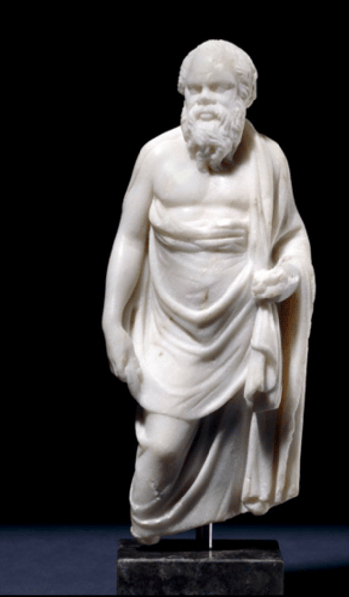 <p>Roman copy in marble, based on Greek original ca. 4th c. BCE. London, British Museum. bald guy, Silenus beard. Wears a himation. old man body.</p>
