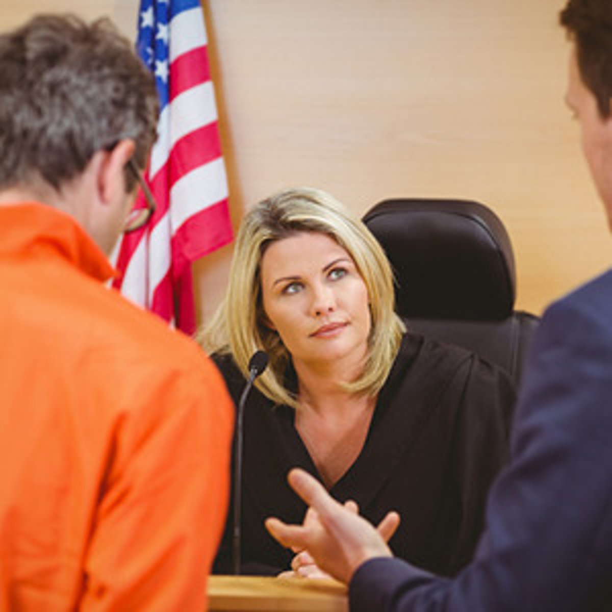 <p>(v) To bring before a court to face charges.</p>
