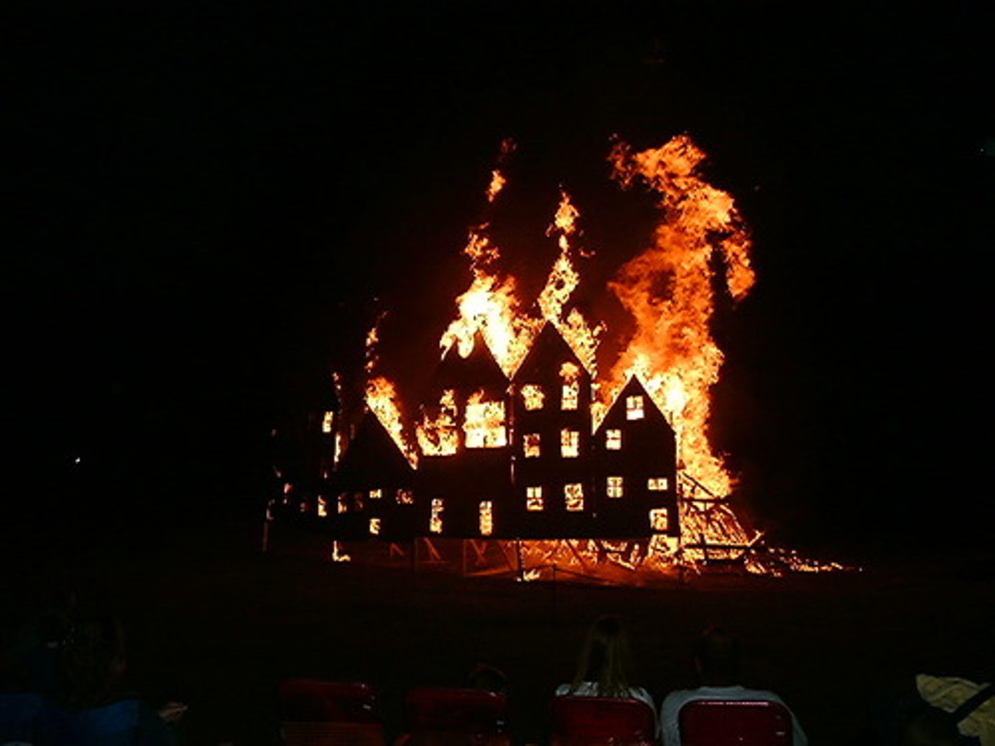 <p>All of the lights in Gatsby's house are on, lighting up that end of West Egg.</p>
