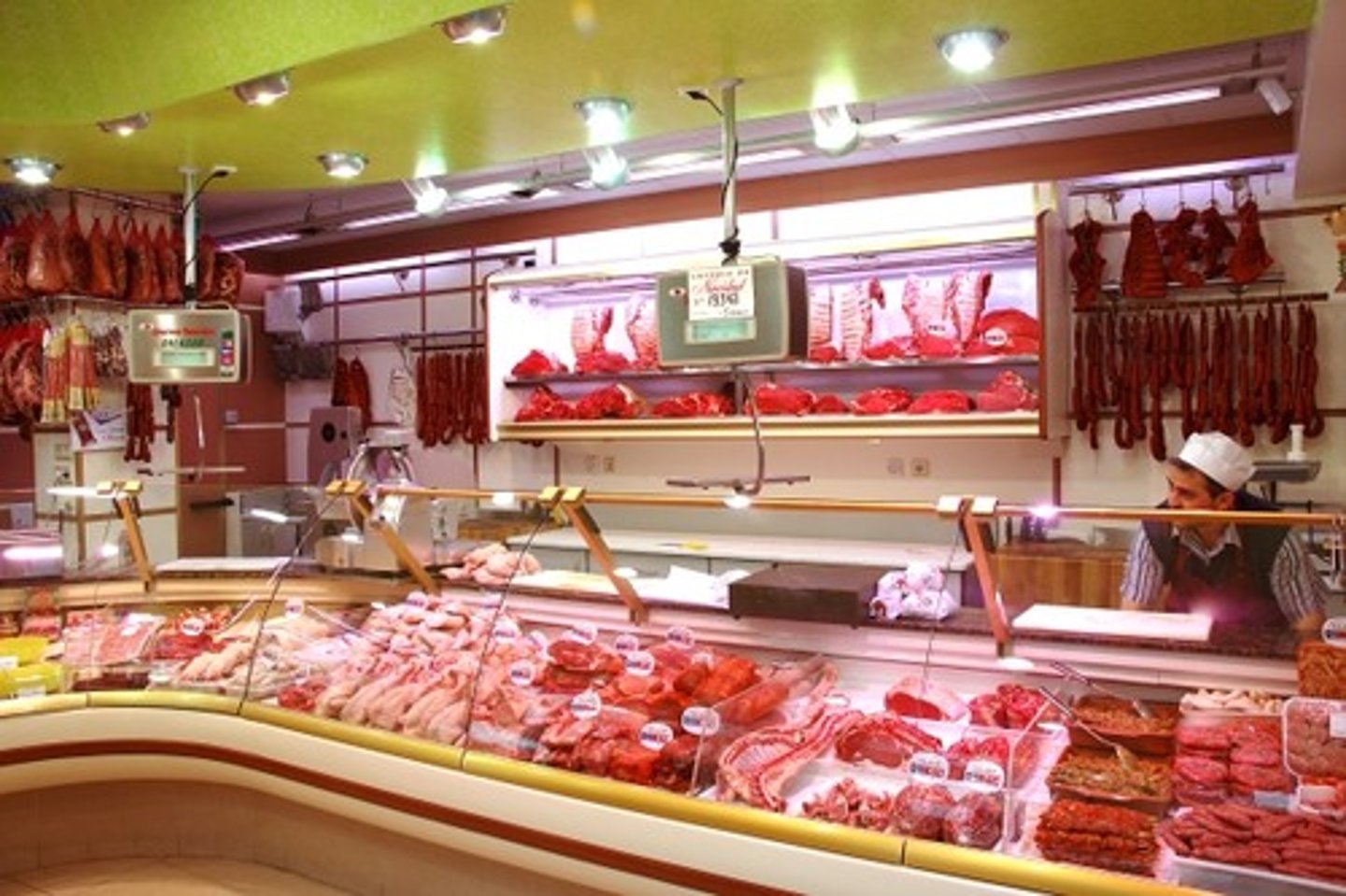 <p>at/to/in the butcher shop (the butcher shop)</p>