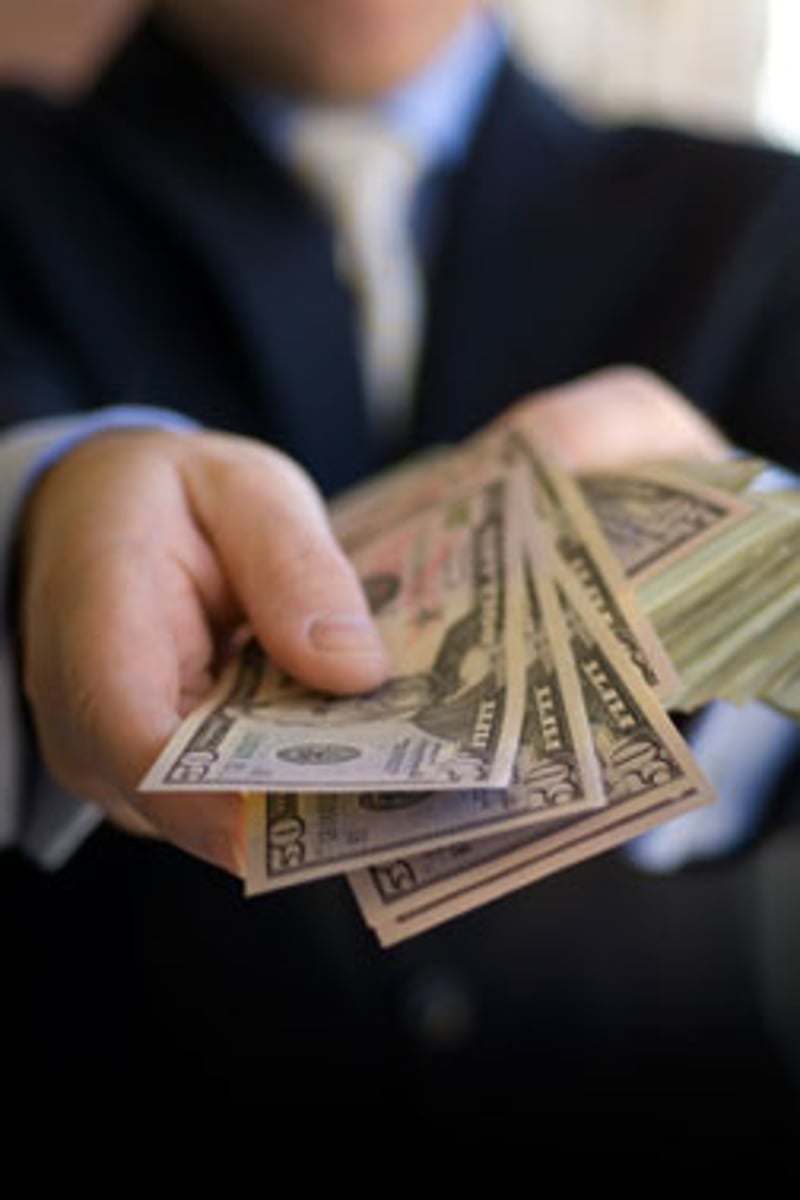 <p>Extremely generous with money (lavish, bountiful)</p>
