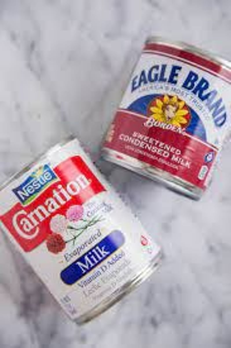 <p>Evaporated milk has 60% of its water removed under vacuum at 50-55°C.</p>