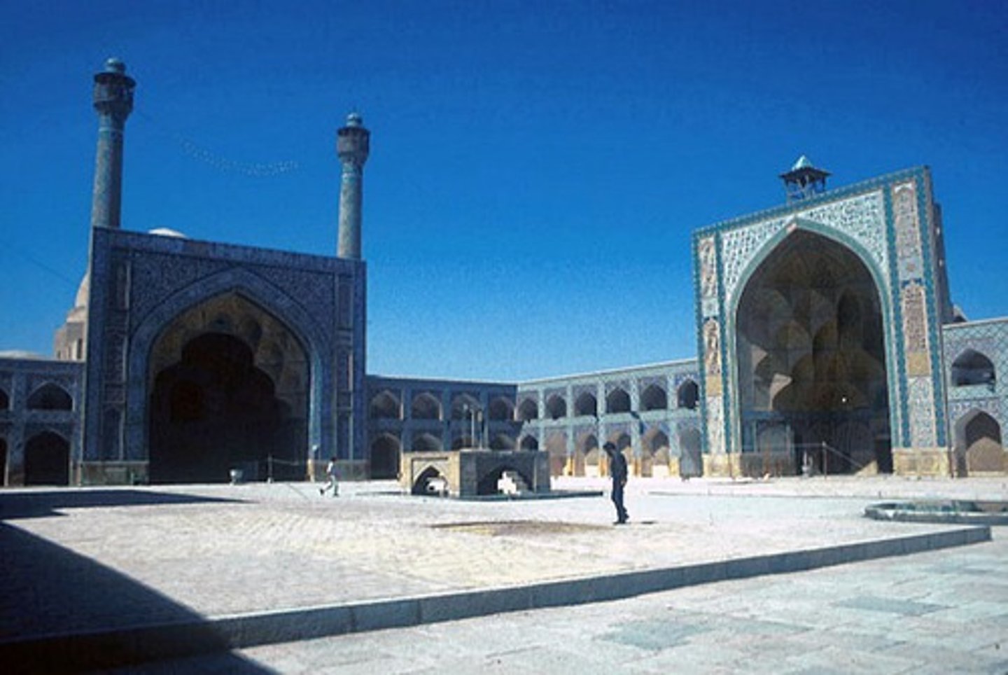 <p>700, brick, wood, plaster, ceramic tile. Isfahan, Iran<br>Originally built in 700, but expansins continued until the 20th century to fit the community (Umma)<br>Most Muslim cities have a congregational mosque. Hubs for the community, flanked with markets and roads.<br>Sahn is away from the noise/traffic, isolated.<br>Has 4 Iwan (arched doorways). One centrally placed for each side<br>Largest most decorative iwan contains 2 minarets, points towards mecca.<br>First mosque to have four iwan construction.</p>