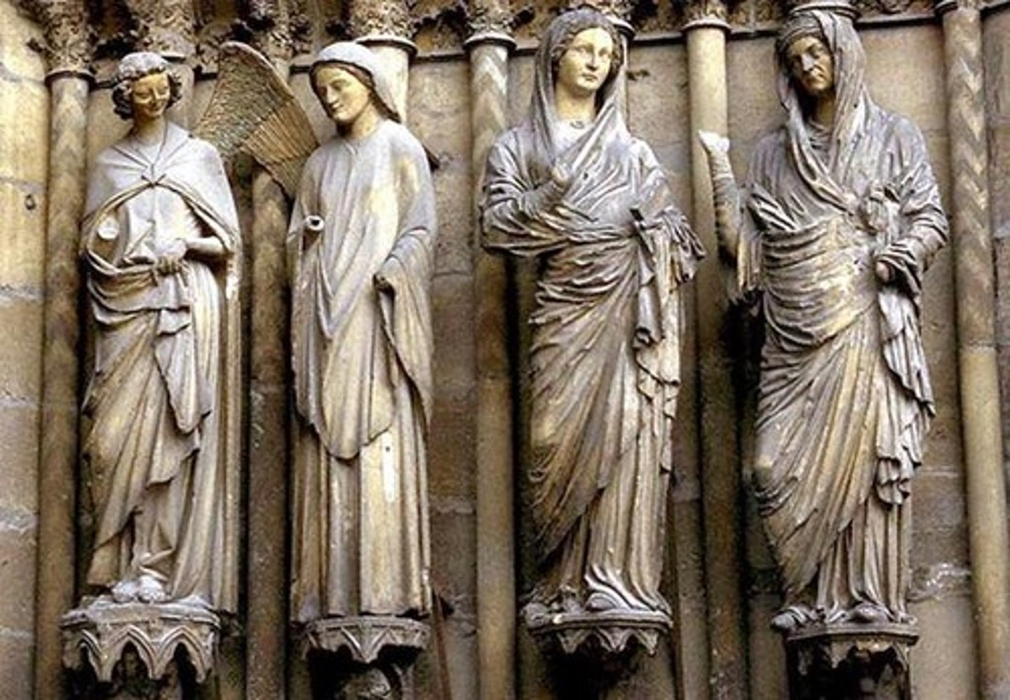 <p>The differences in style between the two pairs of figures confirm the fact that</p><p>A</p><p>the works were carved in different centuries</p><p>B</p><p>several workshops were involved</p><p>C</p><p>different materials were used</p><p>D</p><p>works were imported from other countries</p>