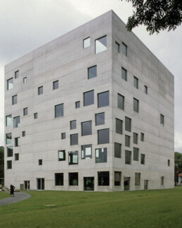 <p>ICONIC: cube, every face has squares focusing eye on building interior</p>