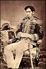In 1868, a Japanese state-sponsored industrialization and westernization effort that also involved the elimination of the Shogunate and power being handed over to the Japanese Emperor, who had previously existed as mere spiritual/symbolic figure.