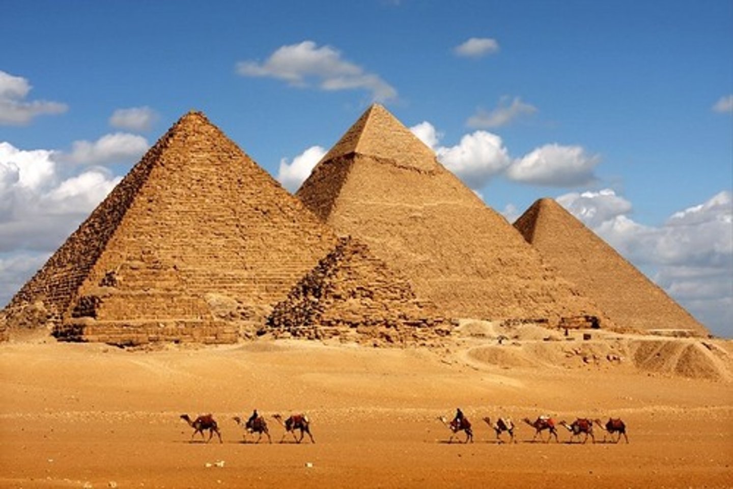 <p>Title: Great Pyramids of Giza (Pyramid of Khufu, Pyramid of Khafre, Pyramid of Menkaure)</p><p>Date: c. 2550-2490 BCE (Old Kingdom, Fourth Dynasty)</p><p>Culture: Ancient Egyptian</p><p>Medium: Limestone and granite</p><p>Location: Giza Plateau, Egypt</p><p>Artwork Type: Architecture</p><p>Function:</p><p>Served as monumental tombs for pharaohs (Khufu, Khafre, Menkaure)</p>
