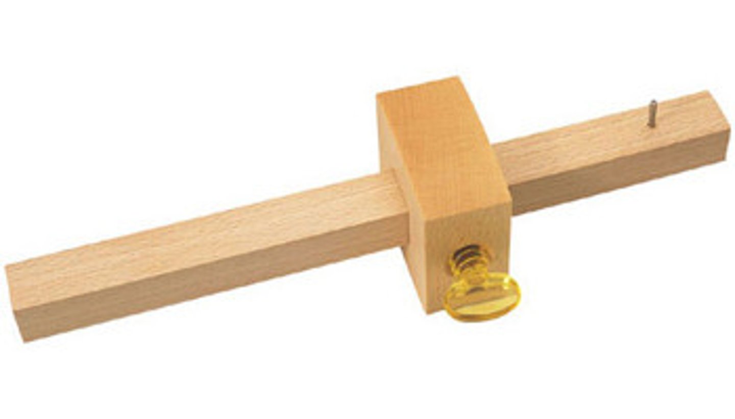 <p>This tool is used to mark a line (using the point) parallel to the edge of a piece of wood. It is mainly used when marking out wood work joints.</p>