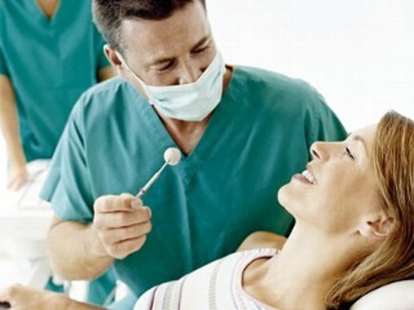 <p>a dentist (male)</p>